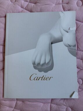 Cartier White and Light Gray Cat Cover Booklet with Gold Logo